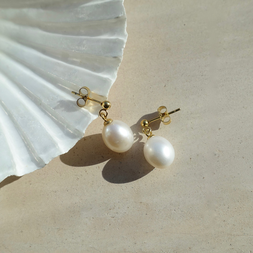 Natural pearl drop earrings in gold