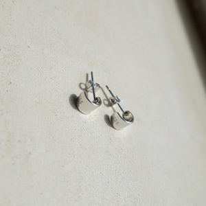 Tiny sterling silver hoops