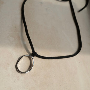 Black cord choker necklace with silver pendant