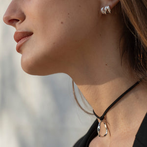 Black leather choker necklace with silver pendant