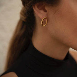 Gold statement stud earrings