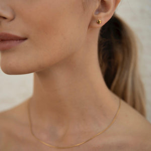 Gold mini stud earrings