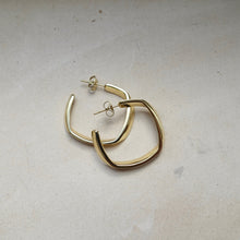 Load image into Gallery viewer, Minimalist and stylish gold hoop earrings
