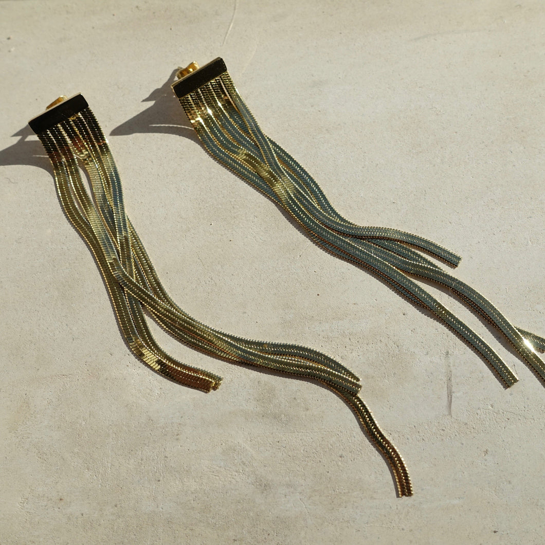 Long drop earrings in gold
